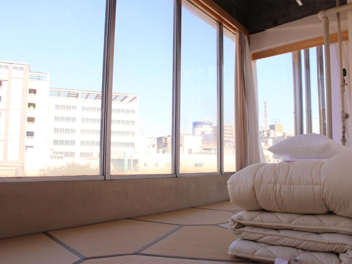 Hostel Tangatable Kitakyushu Buitenkant foto