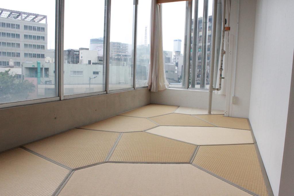 Hostel Tangatable Kitakyushu Buitenkant foto
